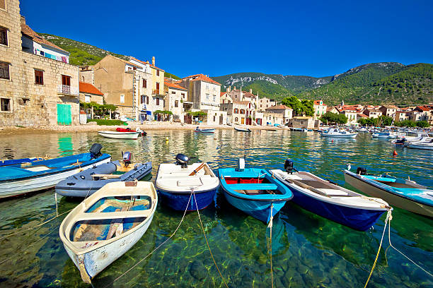 istock Komiza on Vis island turquoise waterfront 596800372