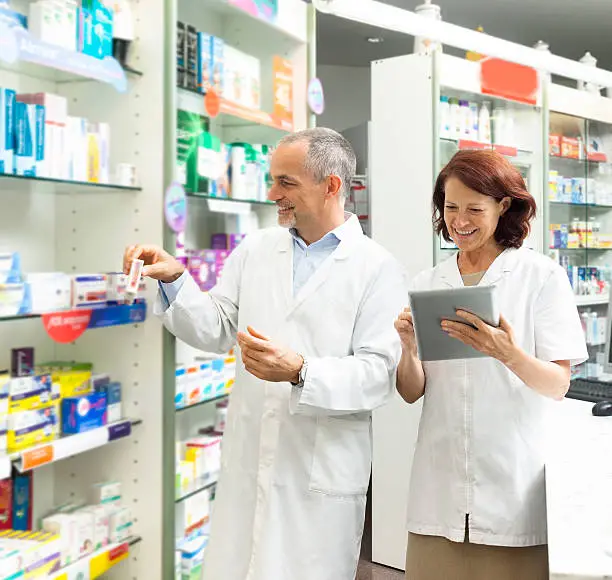 pharmacists doing checklist
