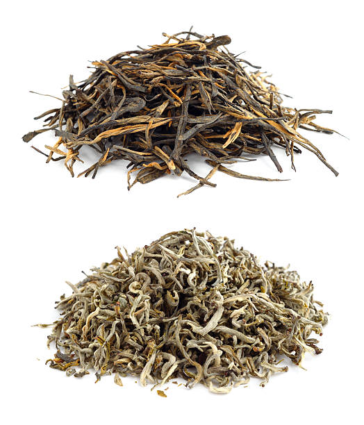 istock Heaps of dried tea isolated on white background 596801160