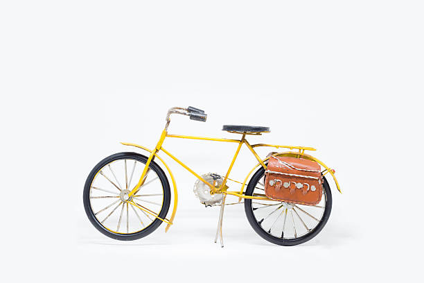 istock hand made yellow bicycle model isolated on white background 596802632