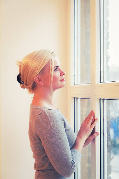 istock Portrait of woman in studio 596802650