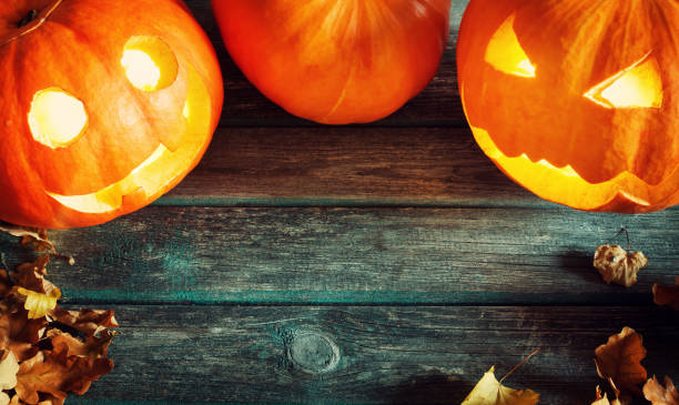 istock pumpkins for halloween with spooky faces 596802728