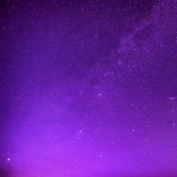 istock Beautiful purple night sky with many stars 596803068