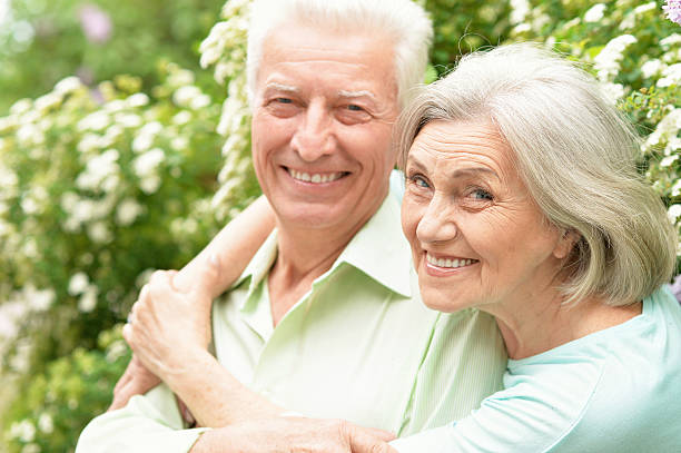 istock Mature couple in spring park 596807164