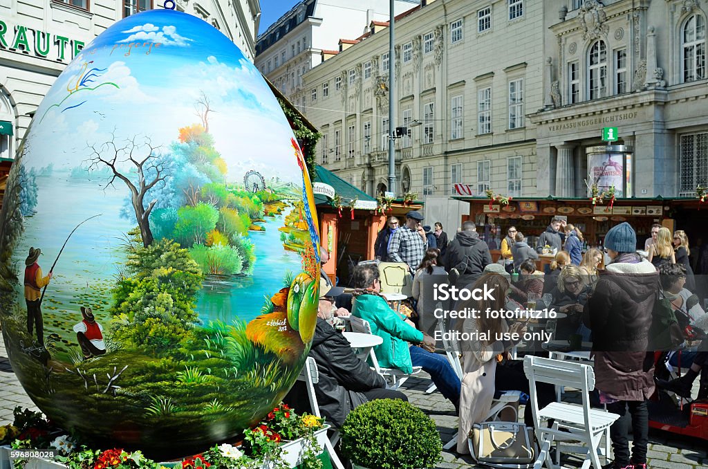 Austria, Easter Market Vienna, Austria - March 27th 2016: Unidentified people and arful decorated giant easter egg on traditional Easter market on Freyung square Easter Stock Photo