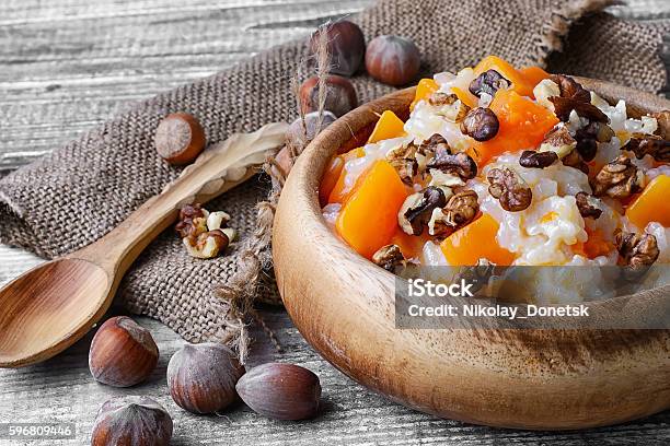 Pumpkin Porridge With Walnuts Stock Photo - Download Image Now - Autumn, Bowl, Breakfast