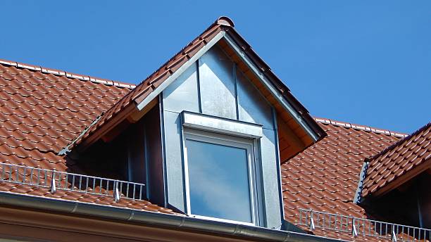 istock Red tile roof with dormers 596812998