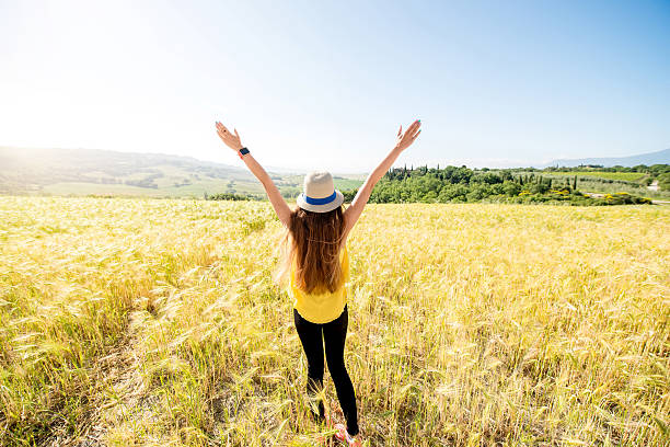 istock Woman in the wheat field 596813892