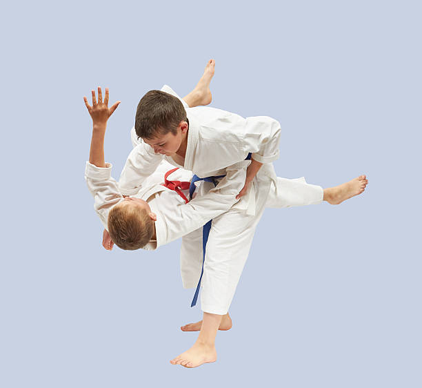 istock Sportsmen are training high throws of Judo 596814568
