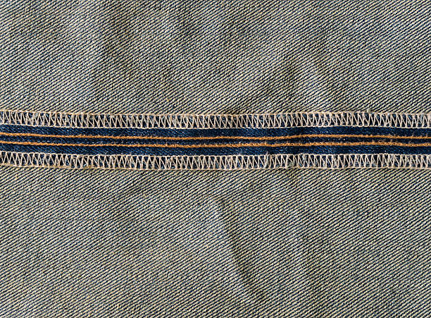 istock horizontal seam inside of blue jeans closeup 596815248