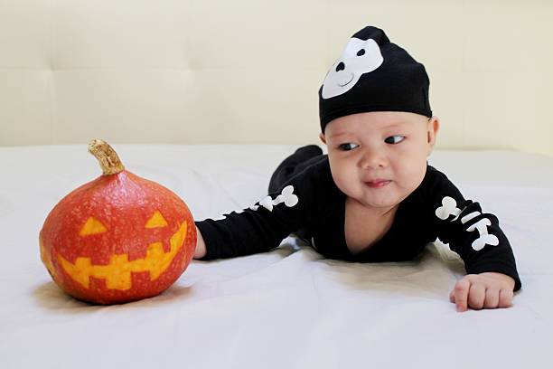 istock Baby boy wearing Halloween costume 596816368