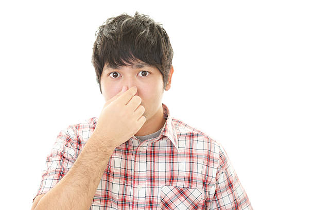 istock Man pinches his nose 596816374