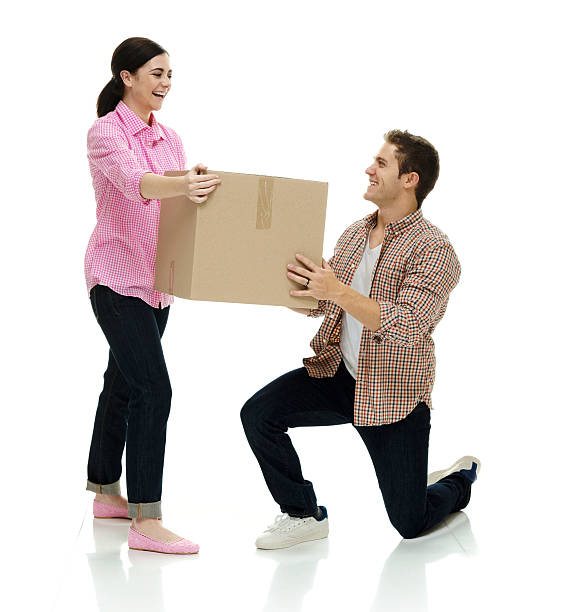 istock Cheerful couple moving house 596817542