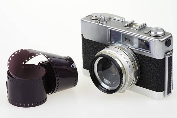istock Analog camera and photographic film 597212760