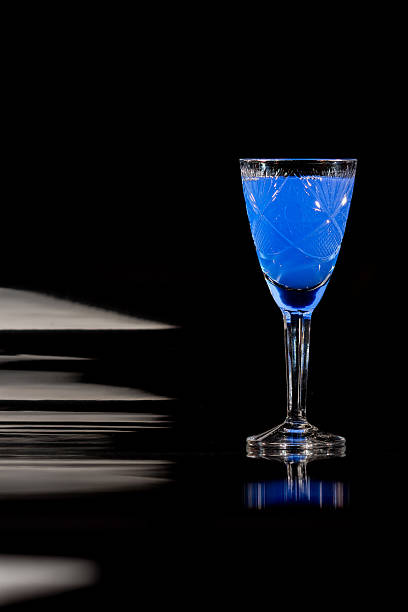 istock Crystal glassware with color liquids 597219488