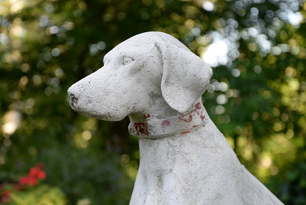 istock Stone statue of a dog 597224756