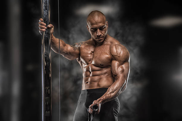 istock Angry athlete trains in the gym 597230048