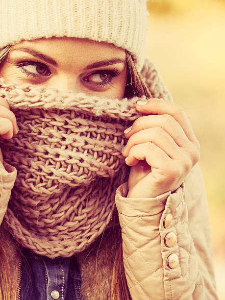 istock Woman with scarf and cap. 597234678