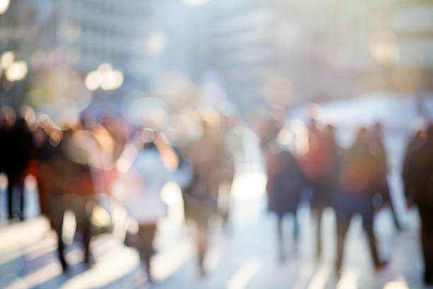 istock blur abstract people background, unrecognizable silhouettes of p 597234714