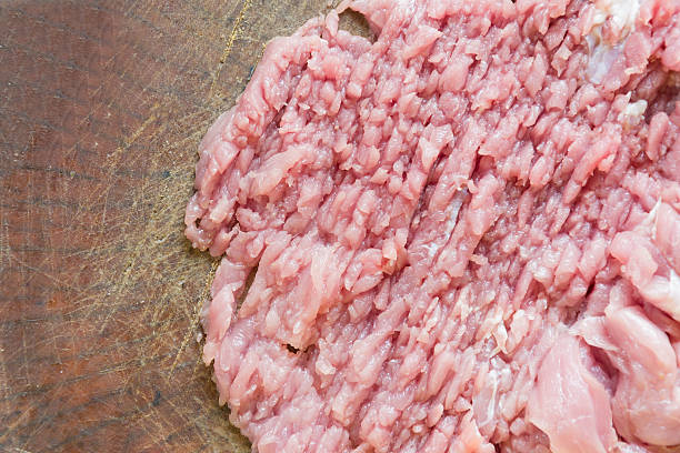 istock cook pork cutlets on chopping board 597243196