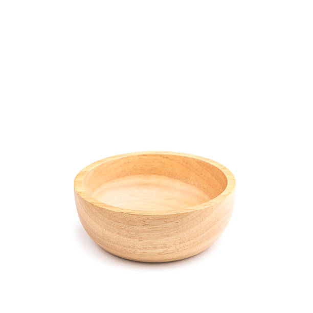 istock Empty bright wooden bowl isolated on white 597249406