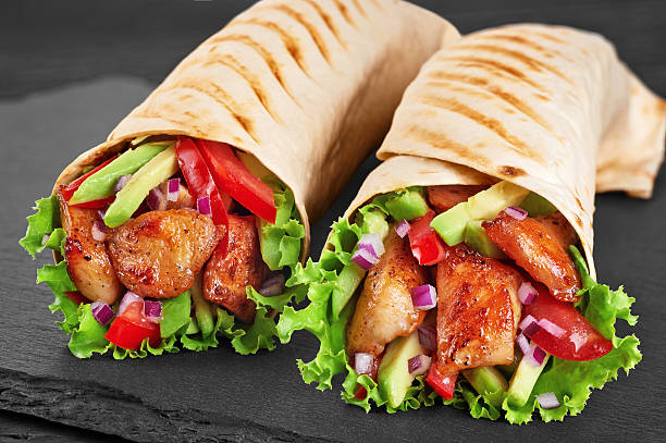 istock Burrito with grilled chicken and vegetables 597249792