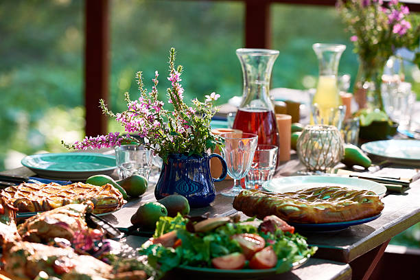 Festive table Festive table with food and drinks on it garden parties stock pictures, royalty-free photos & images