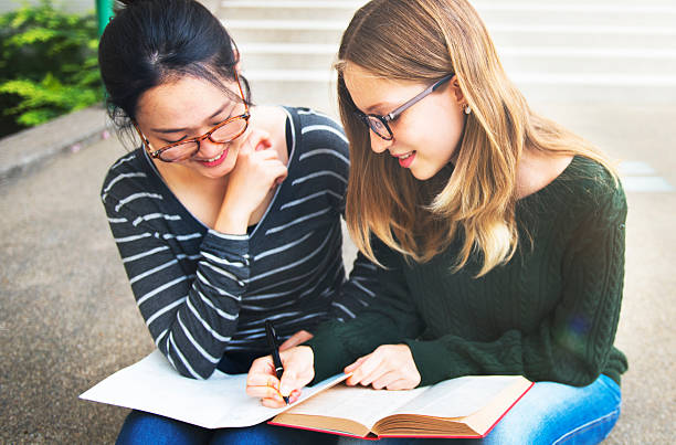 istock Women Talking Friendship Studying Brainstorming Concept 597251754