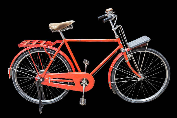 istock Red vintage bicycle isolated on black. Saved with clipping path 597251820