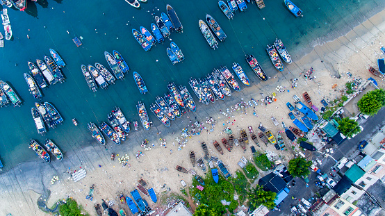 Bird's eye view of a small fishing market on beach, South China