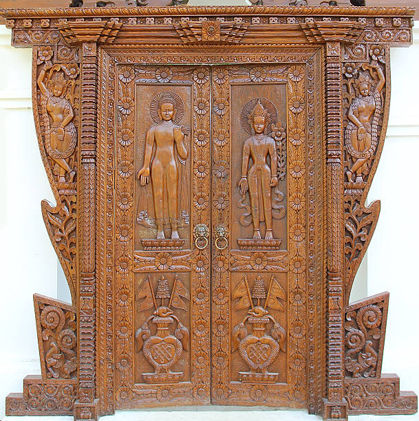 istock Ancient Thai carved doors 597253064