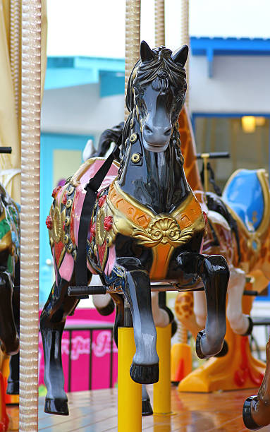istock The horse carousel on the playground 597254946