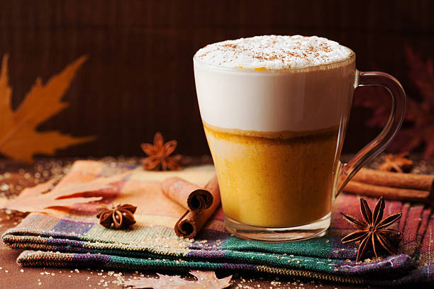 pumpkin spiced latte or coffee. autumn or winter hot drink. - latté pumpkin spice coffee imagens e fotografias de stock