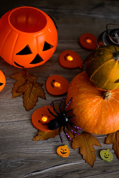 istock Halloween pumpkin head jack lantern on wooden background 597259790