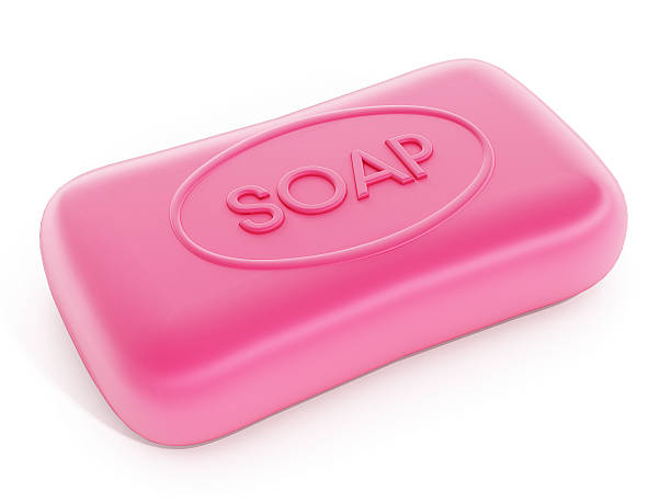 istock Bar of pink soap isolated on white. 597260296