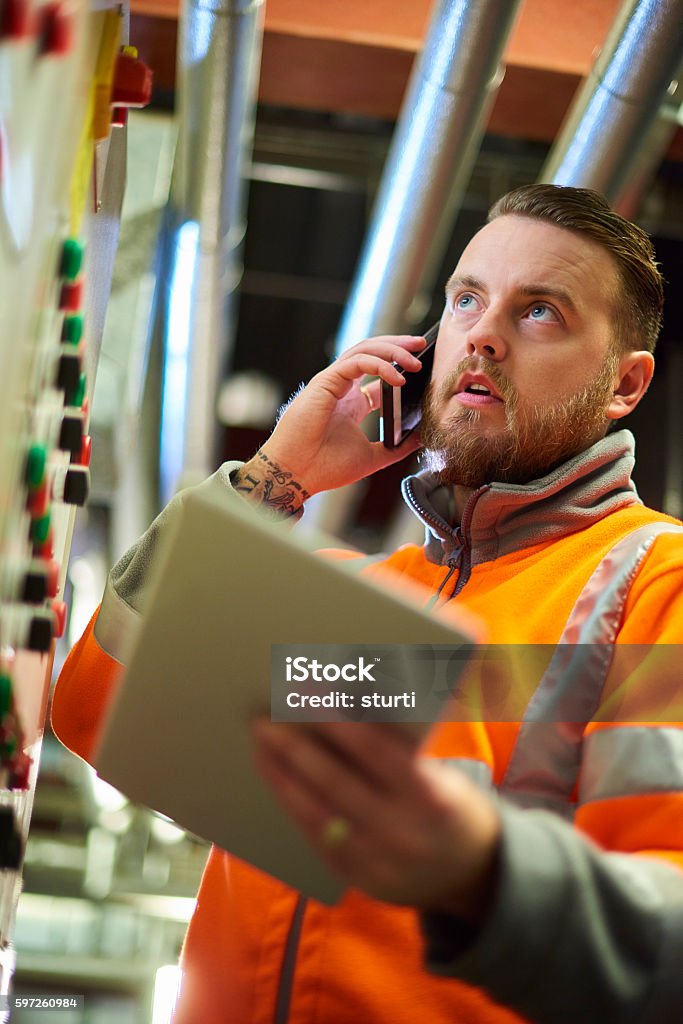 Engineer Calling Engineer Calling Tecnical Support Stock Photo - Download Image Now ...