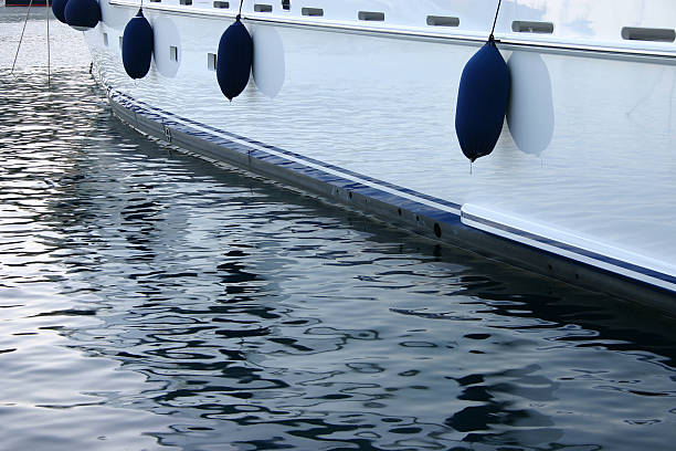 istock yacht detail with reflections 597263572