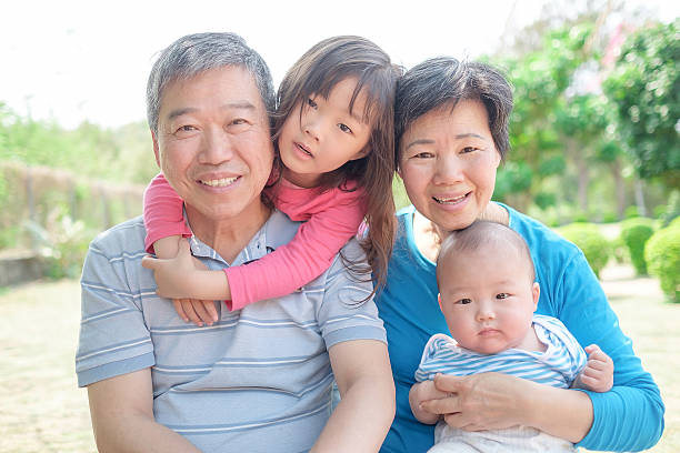 istock grandparents and grandsons smile happily 597264718