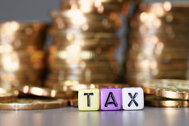 istock Tax word on dices 597267862