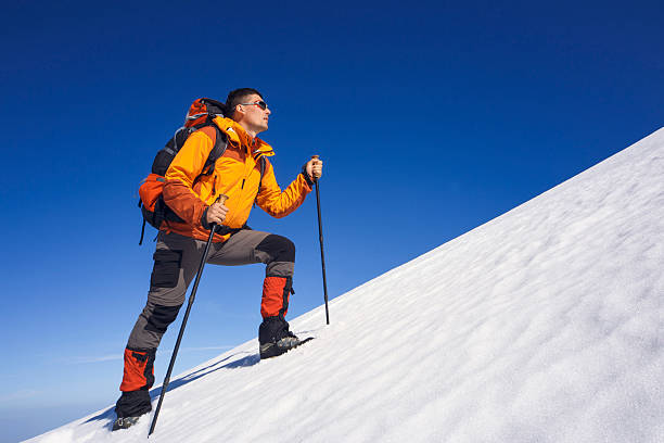 istock Winter hiking in the mountains with a backpack. 597267870