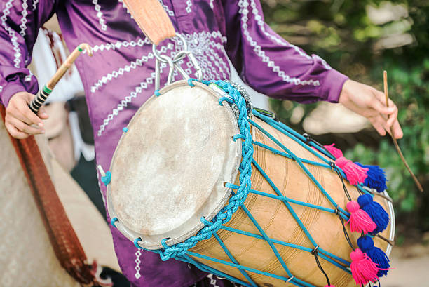 istock Man drumming in Indian wedding ceremonies 597267886