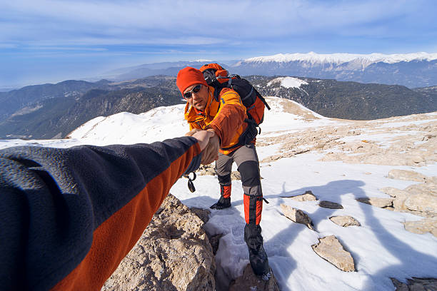 istock Winter hiking in the mountains with a backpack. 597268462