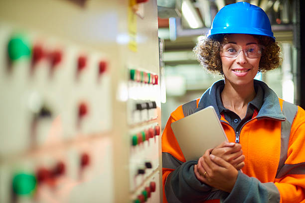 istock female boiler room engineer 597269468