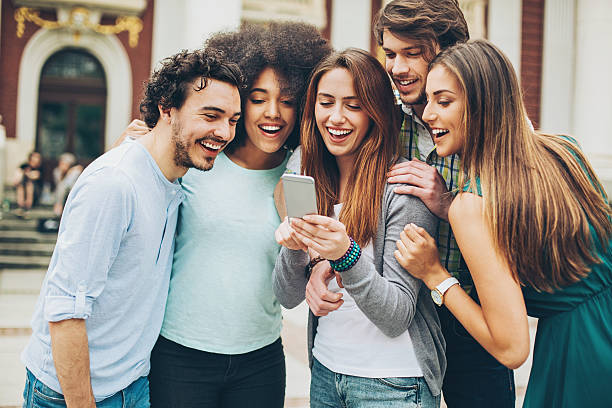 istock Group of friends with smart phone 597269816