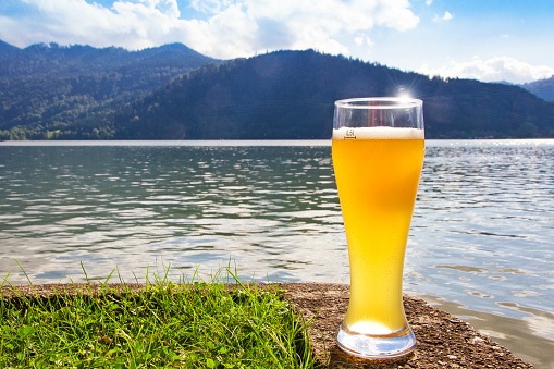 Wheat beer standing on lake Schliersee - Bavaria, Germany