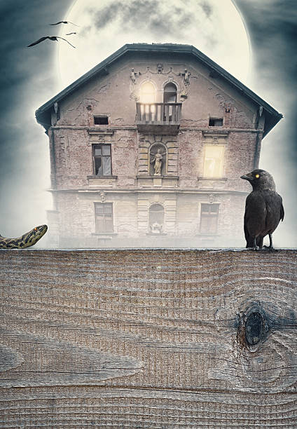 Halloween mystical spooky background with old house and wooden frame