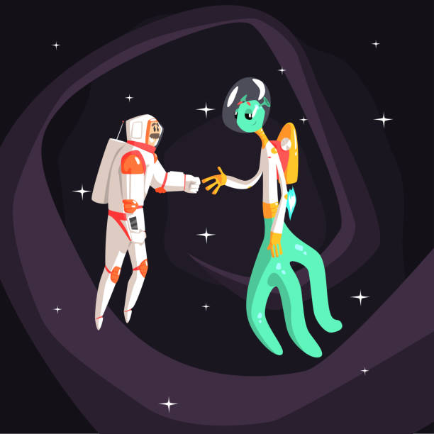 istock Man Astronaut Shaking Hands With Green Male Alien 597276122