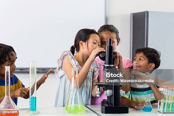 Children Looking In Microscope Stock Photo - Download Image Now - Child, STEM - Topic, Science