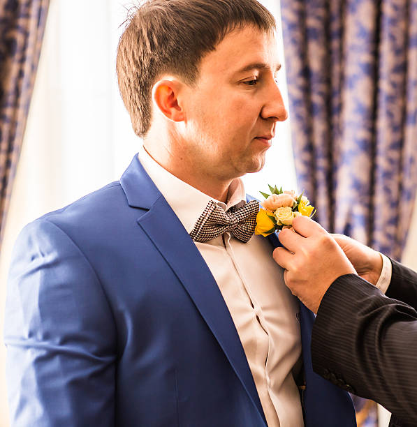 istock Handsome groom prepare for the wedding 597632152