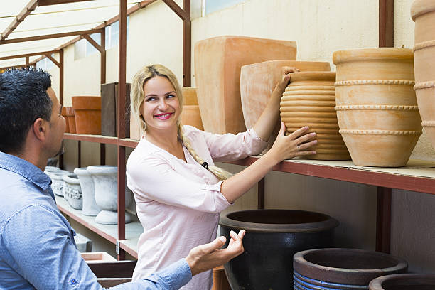 Couple choosing vase for home